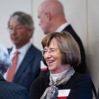 A group of guests talking to one another.